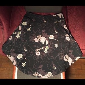 H&M A line circle skirt. Black w/ floral. Size 4